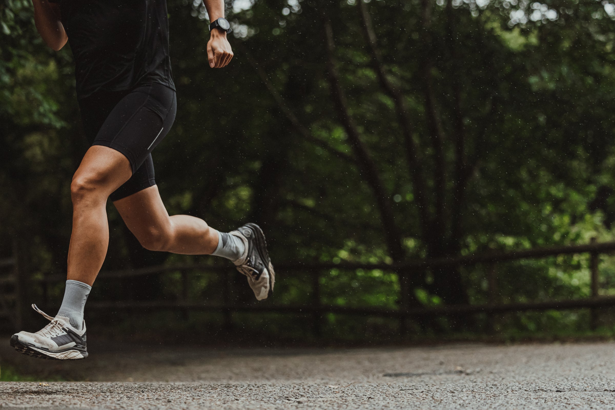 Runner wearing Rockay socks on a forest trail