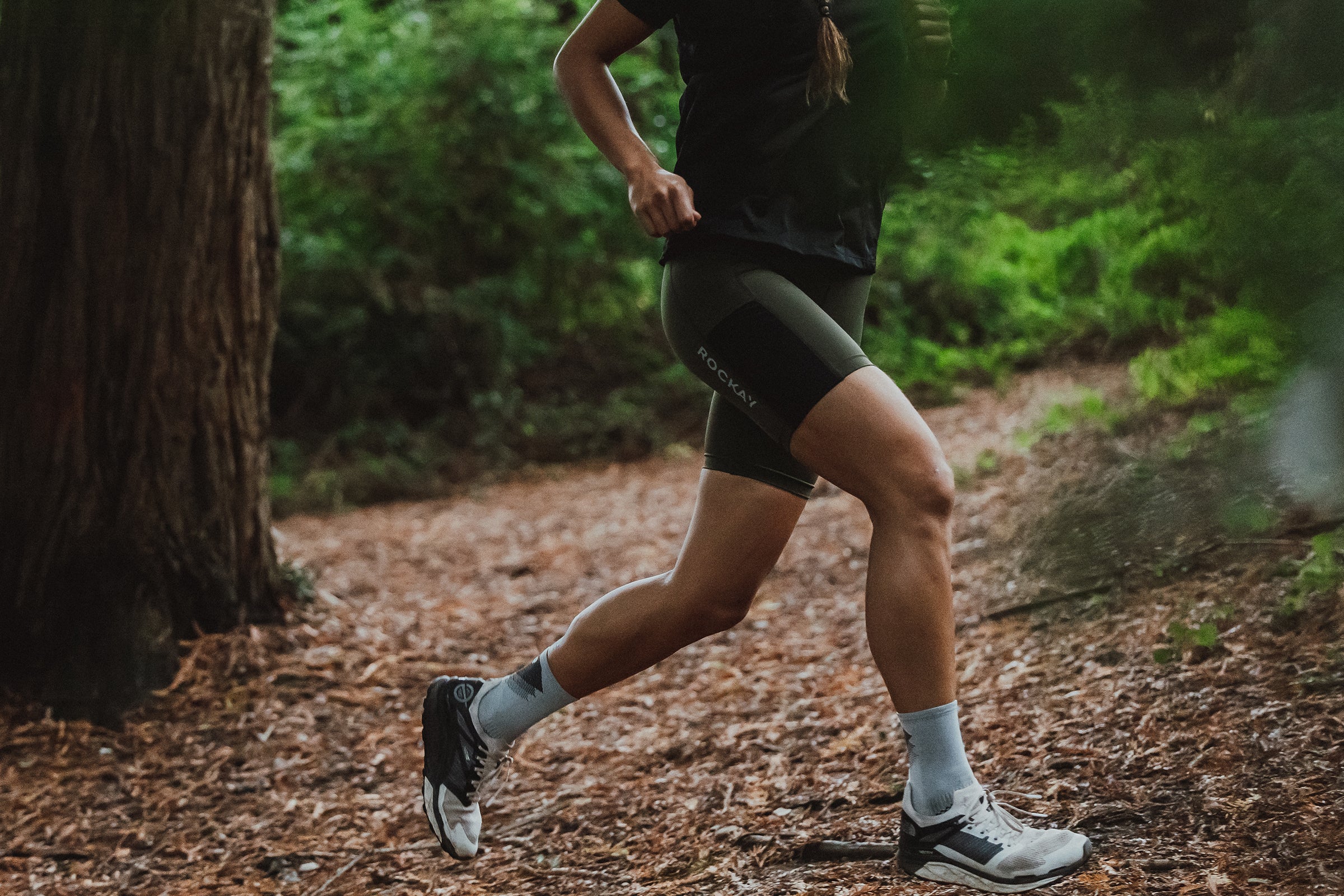 Trail runner wearing Rockay shorts and socks